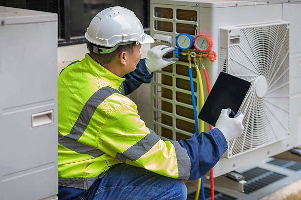 Professional Air Duct Cleaning technician working in Olney, IL